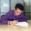 Phạm Duy Thanh tại cơ quan điều tra (Ảnh: PV/Vietnam+)