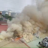 Hiện trường vụ cháy lớn tại 109 Trường Chinh (Ảnh: PV/Vietnam+) 