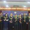 Các luật gia được vinh danh vì những cống hiến cho cộng đồng trong năm 2016 (Ảnh: PV/Vietnam+) 