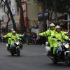 Lực lượng Cảnh sát giao thông làm nhiệm vụ dẫn đường cho đoàn xe của Chủ tịch Kim Jong-un vào sáng 26/2 (Ảnh: Minh Sơn/Vietnam+) 