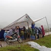 Việc người dân chặn không cho xe vào bãi rác Nam Sơn đã diễn ra trong nhiều năm. Trong ảnh, hàng chục người bất chấp trời mưa vẫn lập lều, lán canh xe (Ảnh chụp tháng 1/2019. Nguồn: Vietnam+) 