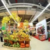 VinMart bố trí điểm bán hoa đào, mai, quất cảnh… tại các siêu thị. (Nguồn: Vingroup)