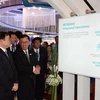 Phó Thủ tướng Hoàng Trung Hải tham quan triển lãm ASCOPE lần thứ 10. (Ảnh: Hoàng Hải/TTXVN)