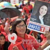 Ngày 30/11, hàng nghìn người "áo đỏ" đã tuần hành tại thủ đô Bangkok, bày tỏ sự ủng hộ Chính phủ của Thủ tướng Thái Lan Yingluck Shinawatra. (Ảnh: THX/TTXVN)