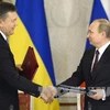 Nga ưu đãi cho Ukraine sau cuộc gặp giữa Tổng thống Vladimir Putin với người đồng nhiệm Ukraine Viktor Yanukovych (Nguồn: AFP/TTXVN)