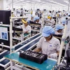 Dây chuyền sản xuất tại Nhà máy sản xuất điện thoại di động Samsung Việt Nam tại Bắc Ninh. (Ảnh: Đức Tám/TTXVN)