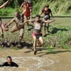 [Photo] Cuộc thi chạy đặc biệt qua rừng rậm và đầm lầy