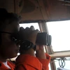 Hoạt động cứu hộ máy bay QZ8501 tạm dừng do thời tiết xấu