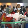 Khách du lịch Nhật Bản đeo khẩu trang phòng bệnh tại sân bay quốc tế Incheon, Hàn Quốc ngày 30/5. (Nguồn: THX/TTXVN)