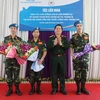 Lễ chia tay 3 cán bộ thuộc Trung tâm Gìn giữ hòa bình Việt Nam lên đường làm nhiệm vụ tại phái bộ Liên hợp quốc ở Cộng hòa Trung Phi. (Ảnh: Hồng Pha/TTXVN)