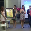 Hoạt động gây quỹ của Quỹ học bổng Hoa Phong Lan đã nhận được sự hưởng ứng của đông đảo cộng đồng người Việt Nam tại Singapore. (Ảnh: Việt Hải/Vietnam+)