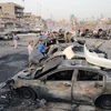 Hiện trường một vụ đánh bom xe ở thủ đô Baghdad. (Nguồn: AFP/TTXVN)