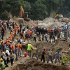 Lực lượng cứu hộ làm việc tại hiện trường vụ lở đất ở Santa Catarina Pinula, ngày 3/10. (Reuters/ TTXVN)