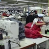 Công nhân may mặc tại Khu công nghiệp chung Kaesong. (Nguồn: theatlantic.com)