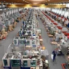 Công nhân làm việc tại nhà máy Playmobil, Đức. (Nguồn: AFP/TTXVN)
