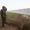 Binh sỹ người Kurd làm nhiệm vụ tại khu vực Ras al-Ain trên biên giới Syria-Thổ Nhĩ Kỳ. (Nguồn: AFP/TTXVN)