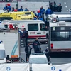 Cảnh sát và lực lượng cứu hộ Bỉ làm nhiệm vụ tại hiện trường vụ tấn công khủng bố ở ga tàu điện ngầm Maelbeek ngày 22/3. (Nguồn: AFP/TTXVN)