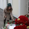 Tưởng niệm các nạn nhân thiệt mạng trong vụ tấn công tại Brussels ngày 22/3. (Nguồn: THX/TTXVN)