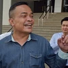 Thủ lĩnh phong trào áo đỏ Jatuporn Prompan (trước) tại tòa án ở Bangkok. (Nguồn: AFP/TTXVN)
