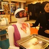 Robot bồi bàn phục vụ tại một nhà hàng ở Trung Quốc. (Nguồn: THX/TTXVN)