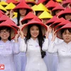 [Photto] Nét duyên dáng vẹn nguyên của áo dài Việt qua các thời đại