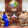 Chủ tịch Quốc hội Lào Pany Yathotou tiếp bà Võ Thị Dung, Phó Bí thư Thành ủy. (Ảnh: Phạm Kiên/TTXVN)