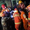Lực lượng cứu hộ tại hiện trường vụ tai nạn. (Nguồn: en.people.cn)