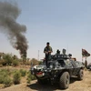 Các lực lượng Iraq trong một chiến dịch truy quét phiến quân IS. (Nguồn: AFP/TTXVN)