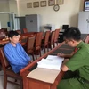 Đối tượng Phạm Văn Nhận tại cơ quan điều tra. (Ảnh: Nguyễn Hoàng/TTXVN)
