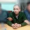 Nguyễn Văn Tình bị bắt giữ. (Ảnh: TTXVN phát)