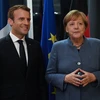Thủ tướng Đức Angela Merkel (phải) và Tổng thống Pháp Emmanuel Macron trong cuộc gặp ở Tallinn, Estonia ngày 28/9. (Nguồn: AFP/TTXVN)