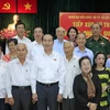 Chủ tịch nước Trần Đại Quang tiếp xúc cử tri quận 1, quận 3 và quận 4 để thông báo kết quả kỳ họp thứ 4, Quốc hội khóa 14. (Ảnh: Nhan Sáng/TTXVN)