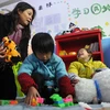 Trẻ em bị nhiễm virus HIV được chăm sóc tại một trung tâm ở Trung Quốc. (Nguồn: THX/TTXVN)