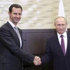 Tổng thống Nga Vladimir Putin (phải) trong cuộc gặp người đồng cấp Syria Bashar al-Assad. (Nguồn: Reuters)