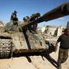Binh sỹ thuộc lực lượng Quân đội quốc gia Libya trong chiến dịch truy quét phiến quân ở Benghazi ngày 9/11. (Nguồn: AFP/TTXVN)
