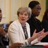 Thủ tướng Anh Theresa May (thứ 2, trái) trong cuộc họp tại London. (Nguồn: AFP/TTXVN)