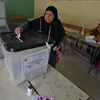 Cử tri Ai Cập bỏ phiếu tại điểm bầu cử tổng thống ở Cairo, ngày 26/3. (nguồn: AFP/TTXVN)