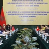 Thứ trưởng Bộ Ngoại giao Việt Nam Vũ Hồng Nam và Quốc vụ khanh Bộ Ngoại giao và hợp tác quốc tế Maroc Mounia Boucetta chủ trì phiên họp chính thức Kỳ họp lần 4. (Ảnh: Lâm Khánh/TTXVN)