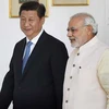 Chủ tịch Trung Quốc Tập Cận Bình và Thủ tướng Ấn Độ Narendra Modi. (Nguồn: firstpost.com)