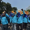 Người dân tham gia tuần hành yêu cầu hạn chế lao động nước ngoài tại Jakarta, Indonesia ngày 1/5. (Nguồn: AFP/TTXVN)