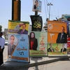 Ápphích giới thiệu các ứng cử viên tranh cử trong cuộc bầu cử Quốc hội Iraq trên đường phố Baghdad ngày 17/4. (Nguồn: AFP/TTXVN)