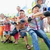 Các em nhỏ hào hứng tham gia các hoạt động trong ngày hội ''Phú Mỹ Hưng hướng về trẻ em năm 2018''. (Ảnh: Thế Anh/TTXVN)