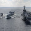 Tàu của Mỹ, Nhật Bản và Ấn Độ tham gia cuộc tập trận chung tại Ấn Độ Dương năm 2015. (Nguồn: AFP/TTXVN)