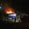 Một tàu cá của người dân Palestine bị máy bay Israel không kích tại thành phố Gaza ngày 23/5. Ảnh minh họa. (Nguồn: THX/TTXVN)