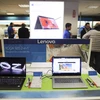 Máy tính xách tay sản xuất tại Trung Quốc được bày bán tại một cửa hàng ở New York, Mỹ hồi tháng Ba. (Nguồn: THX/TTXVN)