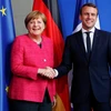 Thủ tướng Đức Angela Merkel và Tổng thống Pháp Emmanuel Macron. (Nguồn: Reuters)