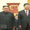Nhà lãnh đạo Triều Tiên Kim Jong-un và Chủ tịch Trung Quốc Tập Cận Bình. (Nguồn: Yonhap/TTXVN)