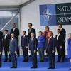 Lãnh đạo các nước thành viên NATO chụp ảnh chung tại hội nghị ở Brussels, Bỉ ngày 11/7. (Nguồn: THX/TTXVN)