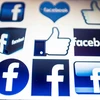 Biểu tượng Facebook trên màn hình máy tính tại Bắc Kinh, Trung Quốc ngày 23/3. (Nguồn: AFP/TTXVN)