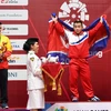Vận động viên Việt Nam Thạch Kim Tuấn (trái) giành huy chương bạc, Om Yun Chol của Triều Tiên giành huy chương vàng. (Ảnh: AFP/TTXVN)